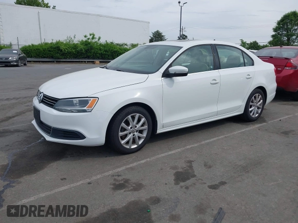 2014 Volkswagen Jetta Sedan SE w/Connectivity/Sunroof PZEV with VIN 3VWD17AJ5EM326425, listed as a IAAI auction lot 42066054 with 125,004 mi miles. Bid and sale history available at carsss.com. Image 2.