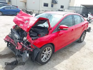 2015 Ford Focus SE z VIN 1FADP3F23FL233620, wystawiony jako IAAI lot #42073204 z przebiegiem 129 109 mil mil oraz . Historia ofert i sprzedaży dostępna na DreamBid. Obrazek 2.