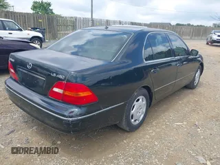 2001 Lexus LS 430 z VIN JTHBN30F810015944, wystawiony jako IAAI lot #42469730 z przebiegiem 273 006 mil mil oraz . Historia ofert i sprzedaży dostępna na DreamBid. Obrazek 4.