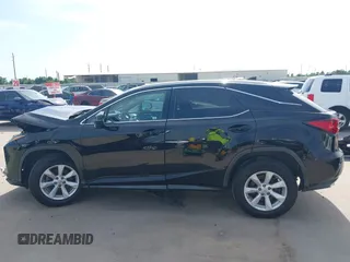 2016 Lexus RX 350 z VIN 2T2BZMCA4GC047800, wystawiony jako IAAI lot #42270406 z przebiegiem 112 181 mil mil oraz . Historia ofert i sprzedaży dostępna na DreamBid. Obrazek 14.