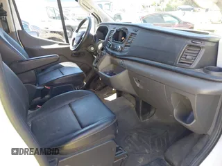 2021 Ford Transit Cargo with VIN 1FTBR2Y80MKA35393, listed as a IAAI auction lot 41732236 with 24,799 mi miles and . Bid and sale history available at DreamBid. Image 5.