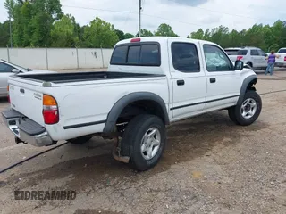 2001 Toyota Tacoma PreRunner z VIN 5TEGN92N11Z738985, wystawiony jako IAAI lot #42145856 z przebiegiem 385 673 mil mil oraz . Historia ofert i sprzedaży dostępna na DreamBid. Obrazek 4.