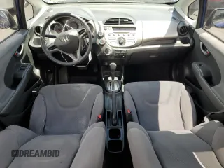 2009 Honda Fit with VIN JHMGE882X9C003678, listed as a Copart auction lot 56688265 with 141,003 mi miles and Salvage title. Bid and sale history available at DreamBid. Image 8.