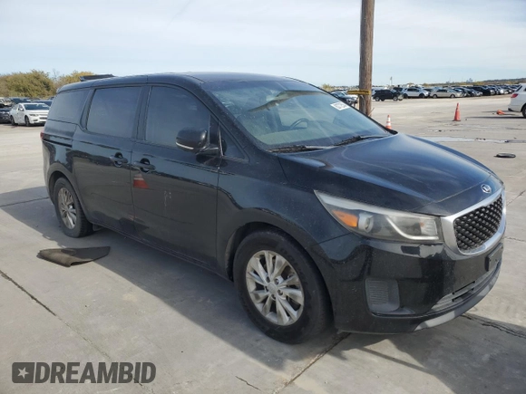 2015 Kia Sedona L with VIN KNDMA5C11F6048368, listed as a Copart auction lot 83772534 with 140,896 mi miles and Clean Title. Bid and sale history available at carsss.com. Image 4.