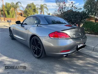 2011 BMW Z4 sDrive35i with VIN WBALM7C57BE383536, listed as a Copart auction lot 49841415 with 107,044 mi miles and Clean Title. Bid and sale history available at carsss.com. Image 3.