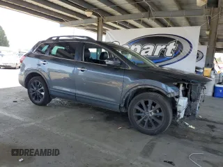 2015 Mazda CX-9 Grand Touring z VIN JM3TB3DV2F0456130, wystawiony jako Copart lot #55787935 z przebiegiem 120 888 mil mil oraz Szkoda całkowita • Salvage title. Historia ofert i sprzedaży dostępna na DreamBid. Obrazek 4.