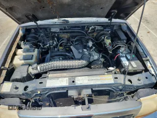 2000 Ford Ranger XLT z VIN 1FTZR15X2YPB55144, wystawiony jako Copart lot #62490945 z przebiegiem 205 615 mil mil oraz Czysty tytuł • Clean title. Historia ofert i sprzedaży dostępna na DreamBid. Obrazek 11.
