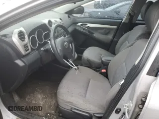 2009 Toyota Matrix S z VIN 2T1KE40E59C006733, wystawiony jako Copart lot #55076015 z przebiegiem 209 724 mil mil oraz Szkoda całkowita • Salvage title. Historia ofert i sprzedaży dostępna na DreamBid. Obrazek 7.