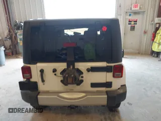 2015 Jeep Wrangler Sahara with VIN 1C4AJWBG7FL648621, listed as a IAAI auction lot 42439781 with 107,148 mi miles and . Bid and sale history available at DreamBid. Image 16.