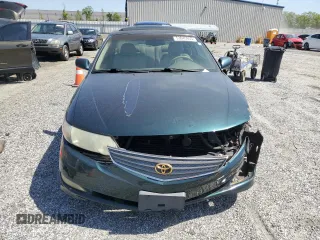 2003 Toyota Solara SE z VIN 2T1CF22P33C603259, wystawiony jako Copart lot #53045935 z przebiegiem 215 054 mil mil oraz Szkody całkowita. Historia ofert i sprzedaży dostępna na DreamBid. Obrazek 5.