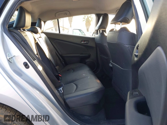 2021 Toyota Prius LE with VIN JTDKAMFP1M3196066, listed as a IAAI auction lot 41752179 with 90,200 mi miles and . Bid and sale history available at DreamBid. Image 8.