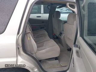 2004 Chevrolet Tahoe LT with VIN 1GNEC13Z04R203993, listed as a IAAI auction lot 42468158 with 233,657 mi miles and . Bid and sale history available at DreamBid. Image 8.