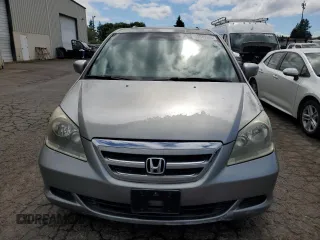 2006 Honda Odyssey EX-L z VIN 5FNRL38796B104224, wystawiony jako Copart lot #59049985 z przebiegiem 161 476 mil mil oraz Czysty tytuł • Clean title. Historia ofert i sprzedaży dostępna na DreamBid. Obrazek 5.