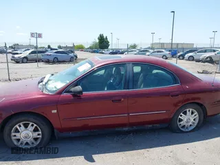 2005 Mercury Sable LS z VIN 1MEFM55S25A622346, wystawiony jako IAAI lot #42379524 z przebiegiem 183 369 mil mil oraz . Historia ofert i sprzedaży dostępna na DreamBid. Obrazek 6.