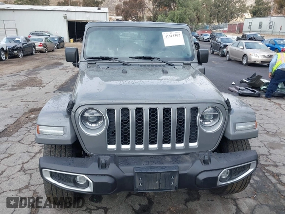 2021 Jeep Wrangler Unlimited Sahara with VIN 1C4JJXP64MW720263, listed as a IAAI auction lot 41514302 with 73,300 mi miles and . Bid and sale history available at DreamBid. Image 13.
