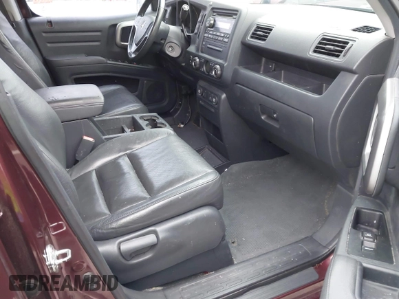 2009 Honda Ridgeline RTL with VIN 5FPYK16529B100032, listed as a IAAI auction lot 41206781 with 130,694 mi miles and . Bid and sale history available at DreamBid. Image 5.