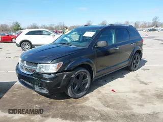 2012 Dodge Journey Crew with VIN 3C4PDCDGXCT257072, listed as a IAAI auction lot 41934176 with 148,339 mi miles and . Bid and sale history available at DreamBid. Image 2.