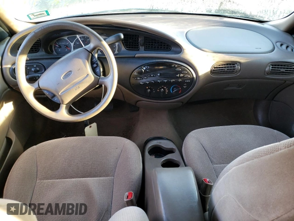 1999 Ford Taurus SE z VIN 1FAFP53U9XG107489, wystawiony jako Copart lot #69576093 z przebiegiem 86 262 mil mil oraz Szkody całkowita. Historia ofert i sprzedaży dostępna na DreamBid. Obrazek 8.