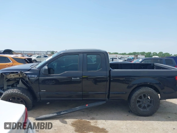 2015 Ford F-150 XL with VIN 1FTEX1CP7FKE54582, listed as a IAAI auction lot 41948341 with 126,309 mi miles and . Bid and sale history available at DreamBid. Image 14.