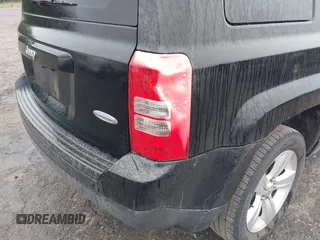 2014 Jeep Patriot Latitude z VIN 1C4NJPFAXED577162, wystawiony jako IAAI lot #42355950 z przebiegiem 123 460 mil mil oraz . Historia ofert i sprzedaży dostępna na DreamBid. Obrazek 6.