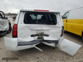 2020 Chevrolet Tahoe Commercial with VIN 1GNLCDEC6LR164083, listed as a Copart auction lot 76721974 with 76,005 mi miles and Salvage Title. Bid and sale history available at carsss.com. Image 6.