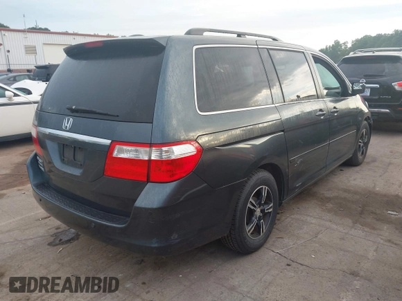 2006 Honda Odyssey TOURING with VIN 5FNRL38816B057196, listed as a IAAI auction lot 42106856 with 186,566 mi miles. Bid and sale history available at carsss.com. Image 4.