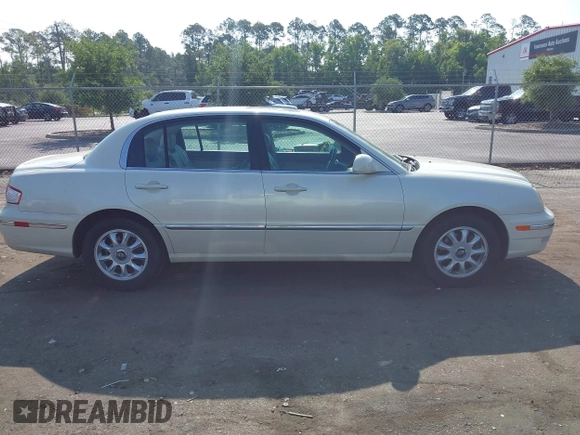 2004 Kia Amanti z VIN KNALD124145015796, wystawiony jako IAAI lot #42308909 z przebiegiem 111 156 mil mil oraz . Historia ofert i sprzedaży dostępna na DreamBid. Obrazek 13.