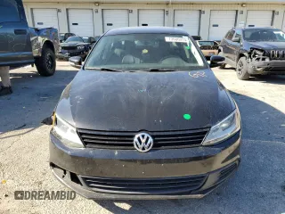 2011 Volkswagen Jetta SE with VIN 3VWDX7AJ2BM013018, listed as a Copart auction lot 73686974 with 145,557 mi miles and Salvage title. Bid and sale history available at DreamBid. Image 5.