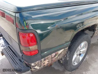 2000 Dodge Ram 1500 with VIN 1B7HC13Y0YJ119724, listed as a IAAI auction lot 41857558 with 173,330 mi miles. Bid and sale history available at carsss.com. Image 6.