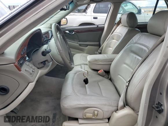 2001 Cadillac DeVille z VIN 1G6KD54Y61U248616, wystawiony jako Copart lot #47057095 z przebiegiem 110 009 mil mil oraz Czysty tytuł • Clean title. Historia ofert i sprzedaży dostępna na DreamBid. Obrazek 7.