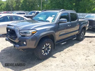 2023 Toyota Tacoma SR with VIN 3TMCZ5AN9PM553246, listed as a IAAI auction lot 42201812 with 20,907 mi miles and . Bid and sale history available at DreamBid. Image 19.