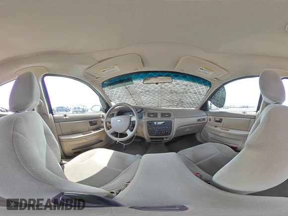 2007 Ford Taurus SE with VIN 1FAFP53U27A156844, listed as a Copart auction lot 59204695 with 157,633 mi miles and Salvage title. Bid and sale history available at DreamBid. Image 14.