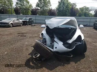 2024 Tesla Model Y with VIN 7SAYGDED9RF133701, listed as a Copart auction lot 64060785 with Not provided miles and Salvage title. Bid and sale history available at DreamBid. Image 14.