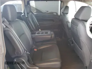 2021 Honda Odyssey Touring with VIN 5FNRL6H88MB040703, listed as a Copart auction lot 60340095 with 66,171 mi miles and Salvage title. Bid and sale history available at DreamBid. Image 11.