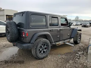 2018 Jeep Wrangler Unlimited Rubicon with VIN 1C4HJXFG7JW167144, listed as a Copart auction lot 48066285 with 132,399 mi miles and Salvage title. Bid and sale history available at DreamBid. Image 3.