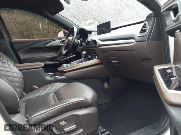 2021 Mazda CX-9 Signature with VIN JM3TCBEY4M0517118, listed as a IAAI auction lot 42400675 with 56,260 mi miles and . Bid and sale history available at DreamBid. Image 5.