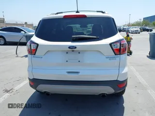 2018 Ford Escape Titanium with VIN 1FMCU0J94JUB26110, listed as a IAAI auction lot 42436285 with 59,586 mi miles and . Bid and sale history available at DreamBid. Image 16.