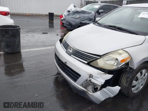 2009 Nissan Versa S with VIN 3N1BC11E39L364397, listed as a IAAI auction lot 41788772 with 223,959 mi miles and . Bid and sale history available at DreamBid. Image 6.