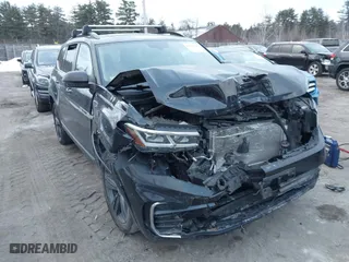 2021 Volkswagen Atlas 3.6L V6 SE w/Technology R-Line with VIN 1V2RR2CA1MC510406, listed as a IAAI auction lot 41428715 with 104,419 mi miles. Bid and sale history available at carsss.com. Image 1.