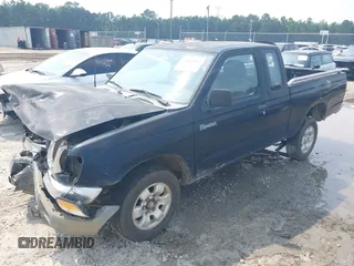 1998 Nissan Frontier XE with VIN 1N6DD26S4WC358779, listed as a IAAI auction lot 42401882 with Not provided miles and . Bid and sale history available at DreamBid. Image 2.