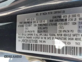 2016 Mazda CX-5 Sport with VIN JM3KE2BY2G0781565, listed as a IAAI auction lot 42042256 with 182,186 mi miles. Bid and sale history available at carsss.com. Image 9.