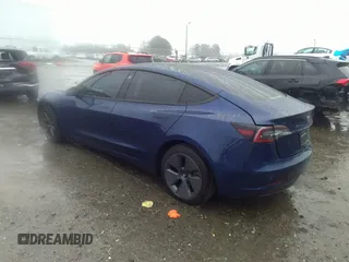 2023 Tesla Model 3 z VIN 5YJ3E1EA4PF576045, wystawiony jako IAAI lot #41565981 z przebiegiem Nie podano mil oraz . Historia ofert i sprzedaży dostępna na DreamBid. Obrazek 3.