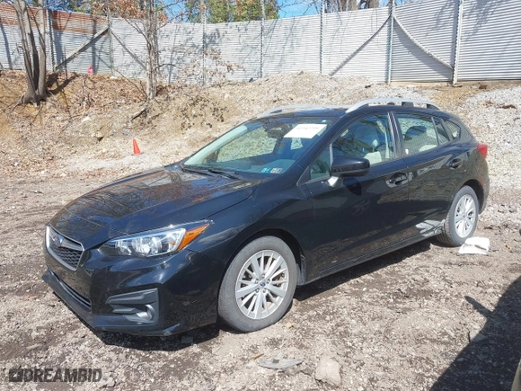 2017 Subaru Impreza Premium with VIN 4S3GTAD65H3716428, listed as a IAAI auction lot 41942299 with 77,181 mi miles. Bid and sale history available at carsss.com. Image 18.