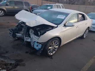 2014 Cadillac XTS Premium with VIN 2G61P5S30E9123057, listed as a IAAI auction lot 41301457 with 123,042 mi miles and . Bid and sale history available at DreamBid. Image 2.