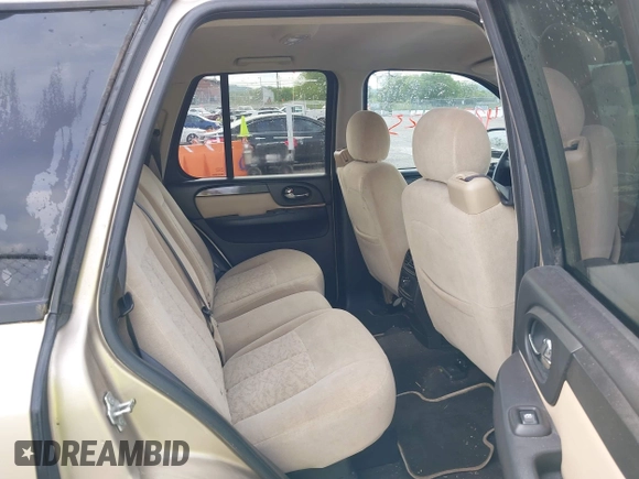 2005 GMC Envoy SLT with VIN 1GKDS13S452141376, listed as a IAAI auction lot 42095025 with 198,911 mi miles and . Bid and sale history available at DreamBid. Image 8.