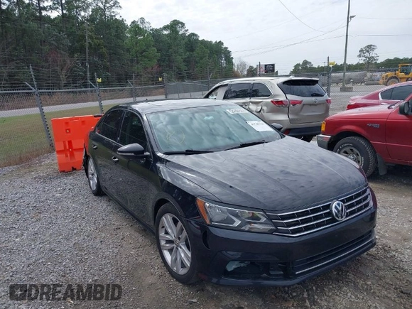 2019 Volkswagen Passat 2.0T Wolfsburg Edition with VIN 1VWLA7A33KC003355, listed as a IAAI auction lot 41545733 with 95,801 mi miles. Bid and sale history available at carsss.com. Image 1.