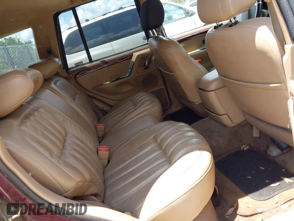 2000 Jeep Grand Cherokee Laredo with VIN 1J4G258S4YC381030, listed as a IAAI auction lot 42541918 with 306,934 mi miles and . Bid and sale history available at DreamBid. Image 8.
