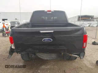 2020 Ford F-150 XL with VIN 1FTEW1E56LKE34768, listed as a IAAI auction lot 41807705 with 83,898 mi miles and . Bid and sale history available at DreamBid. Image 17.