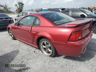 2004 Ford Mustang GT Deluxe with VIN 1FAFP42X64F174672, listed as a Copart auction lot 59902025 with 83,386 mi miles and Salvage title. Bid and sale history available at DreamBid. Image 2.