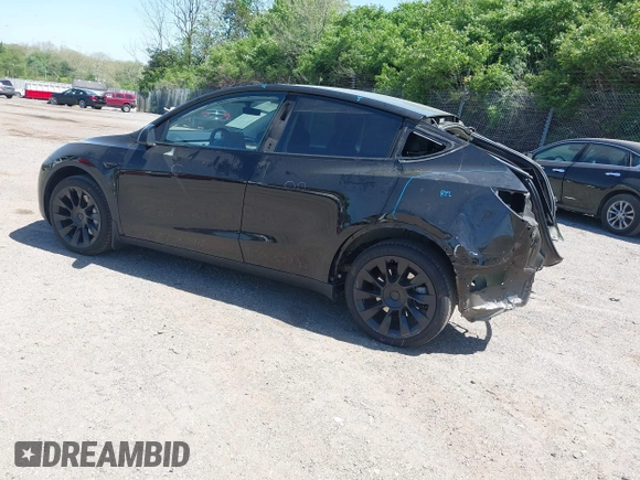 2023 Tesla Model Y Long Range with VIN 7SAYGDEE0PA111430, listed as a IAAI auction lot 42156924 with 35,950 mi miles and . Bid and sale history available at DreamBid. Image 3.